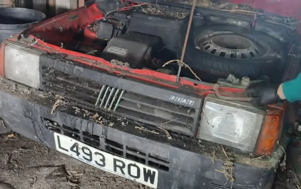 A 1980s car is recovered during a UK rescue after 15 years as a garage find, revealing neglect, survival, and a stray Mazda detail