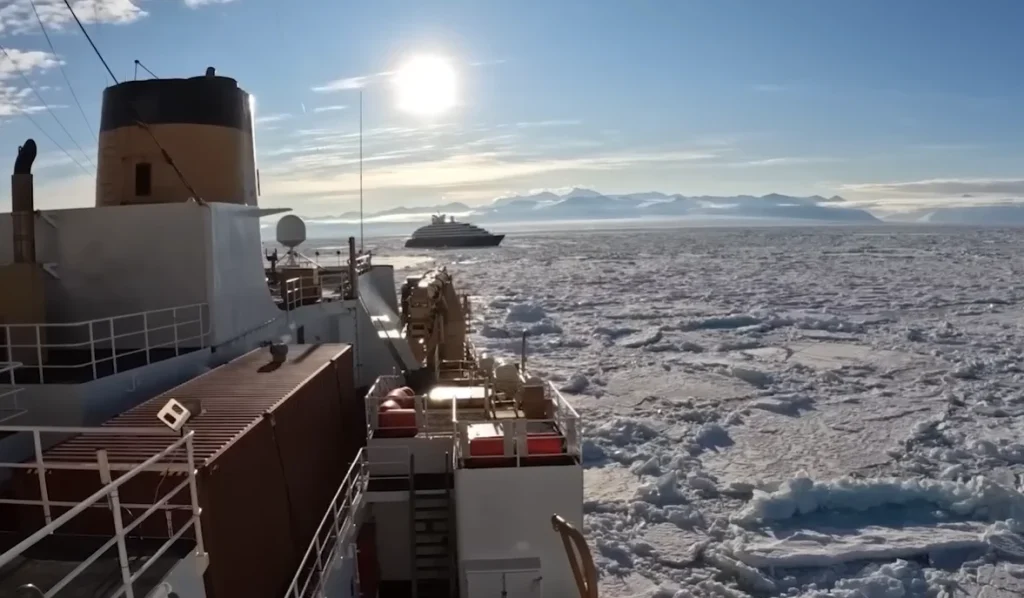US Coast Guard's icebreaker smashes through Antarctic ice to rescue a cruise ship that got stuck