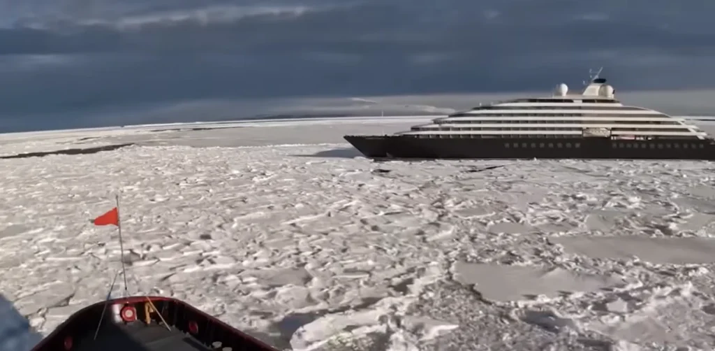 US Coast Guard's icebreaker smashes through Antarctic ice to rescue a cruise ship that got stuck
