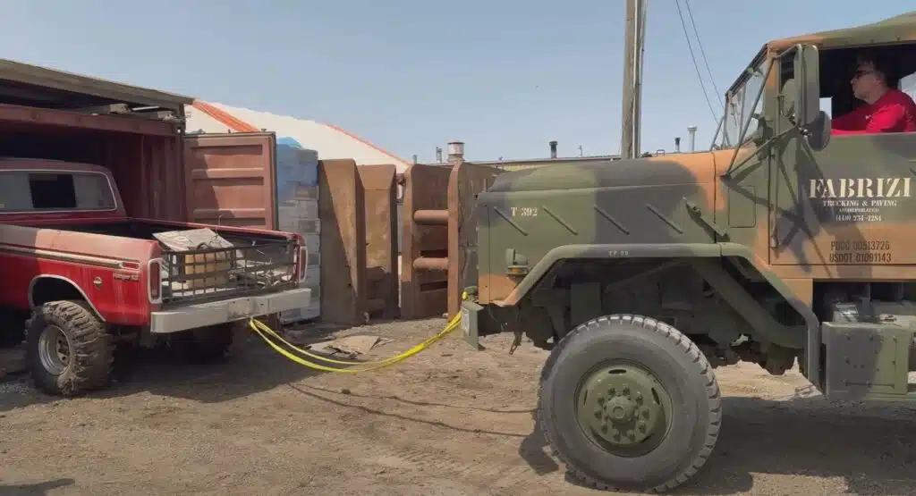 A huge dusty truck, a Ford F250 and classic truck, was found after 20 years in storage and fully restored to running condition by a detailing crew.