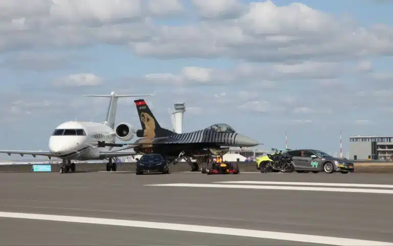 The quickest vehicles collided in the ultimate drag race, including a Lotus supercar, a Kawasaki bike, a Red Bull F1 car, a private jet, and an F16 fighter jet