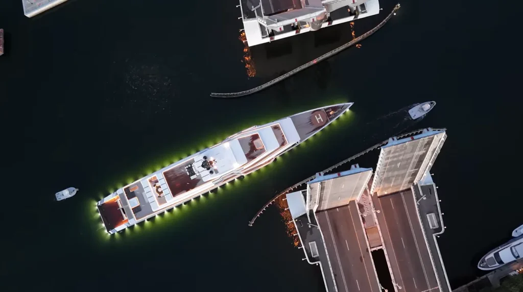 Florida car owners look on as captain tries to squeeze $275,000,000 superyacht through unforgiving bridge