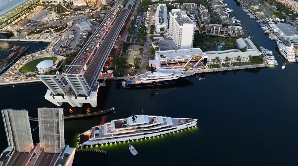 Florida car owners look on as captain tries to squeeze $275,000,000 superyacht through unforgiving bridge