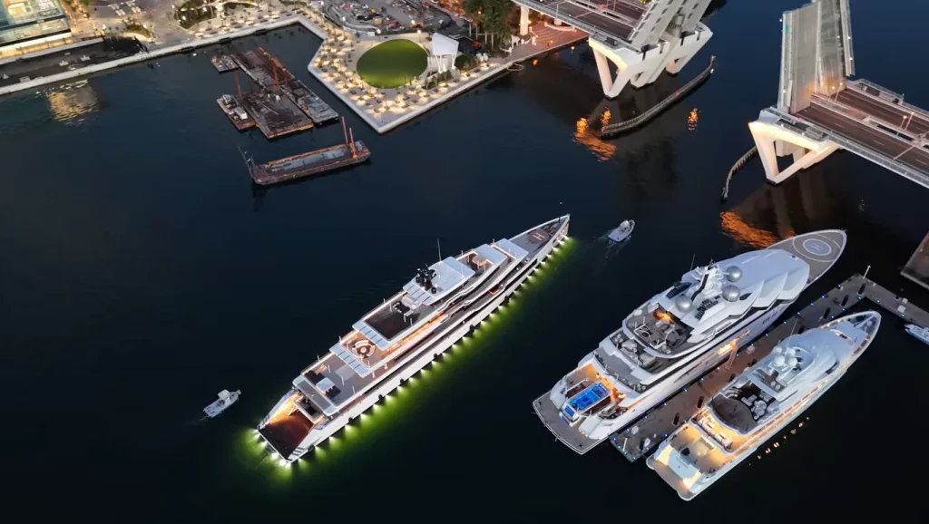 Florida car owners look on as captain tries to squeeze luxury $275M superyacht through unforgiving bridge in nerve-wracking moment