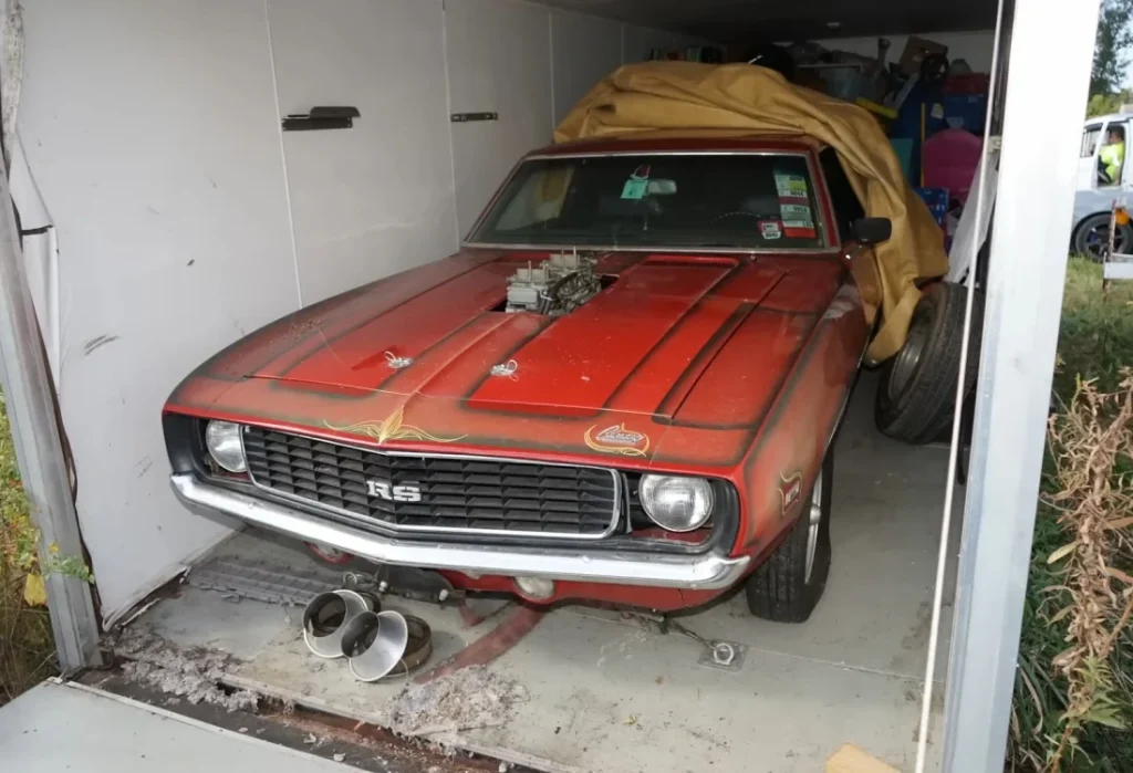 Abandoned Illinois trailer sealed since the 1990s is opened to reveal an ultra-rare muscle car sitting inside