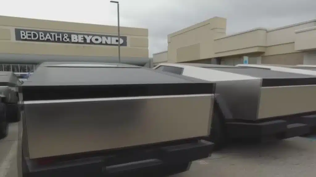 Teslas in a Detroit parking lot, with EVs unsold