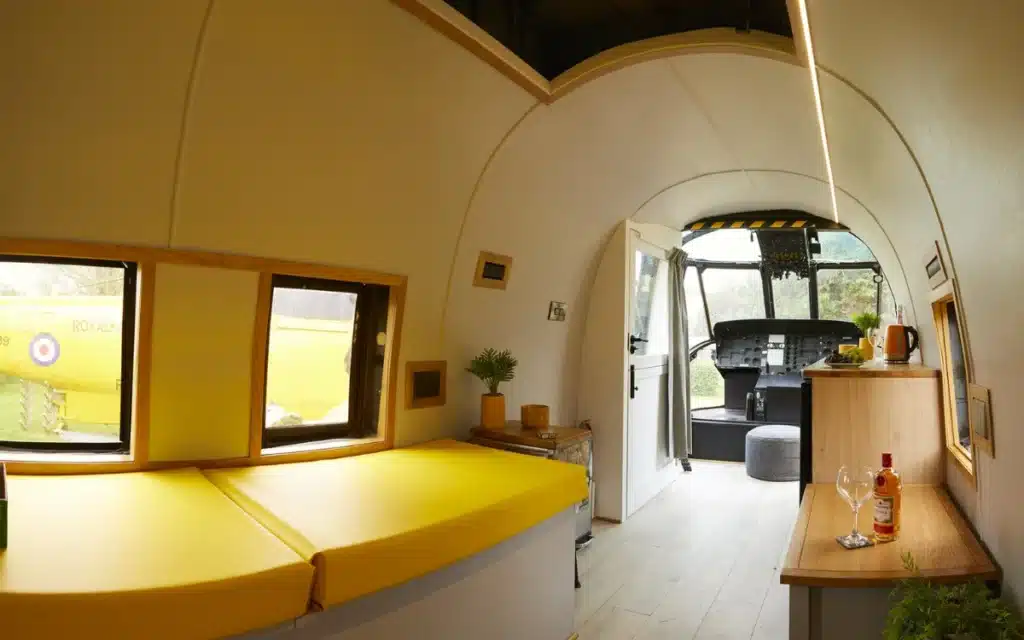Unique vacation destination lets visitors sleep inside old rescue helicopters with original controls