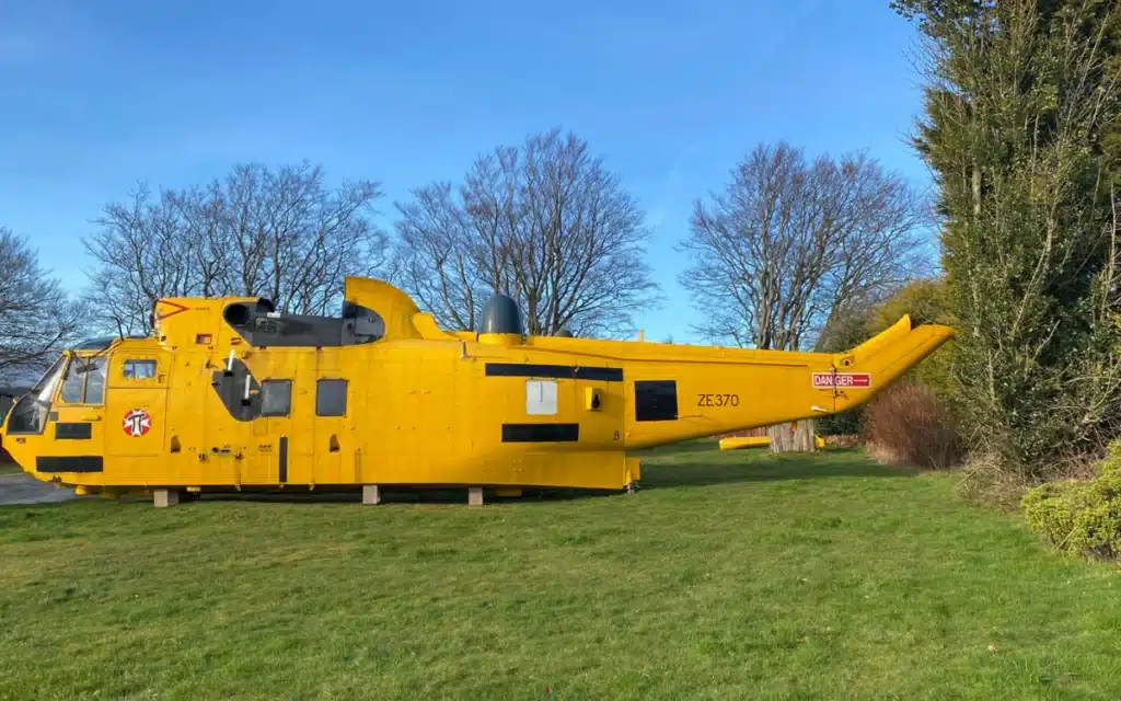 An old Sea King rescue helicopter, converted into a glamping spot