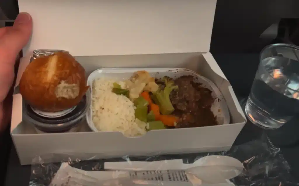 Dinner service onboard Norse Atlantic Airways, the cheapest transatlantic flight