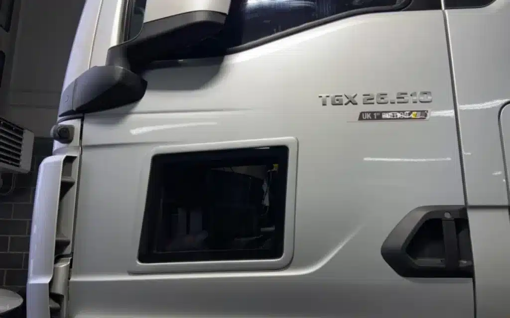 If you've ever wondered why semi truck passenger doors have little windows on them, we have the answer