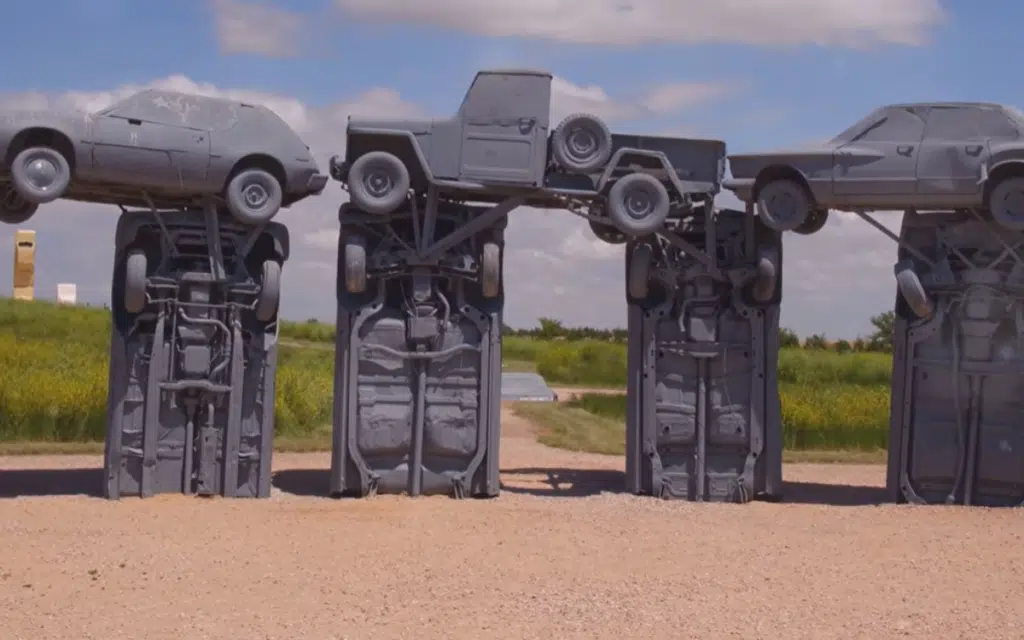 In Nebraska, 39 spray-painted cars stand in a perfect circle. Carhenge is a Nebraska car monument that’s part tribute, part art, and entirely unexpected.