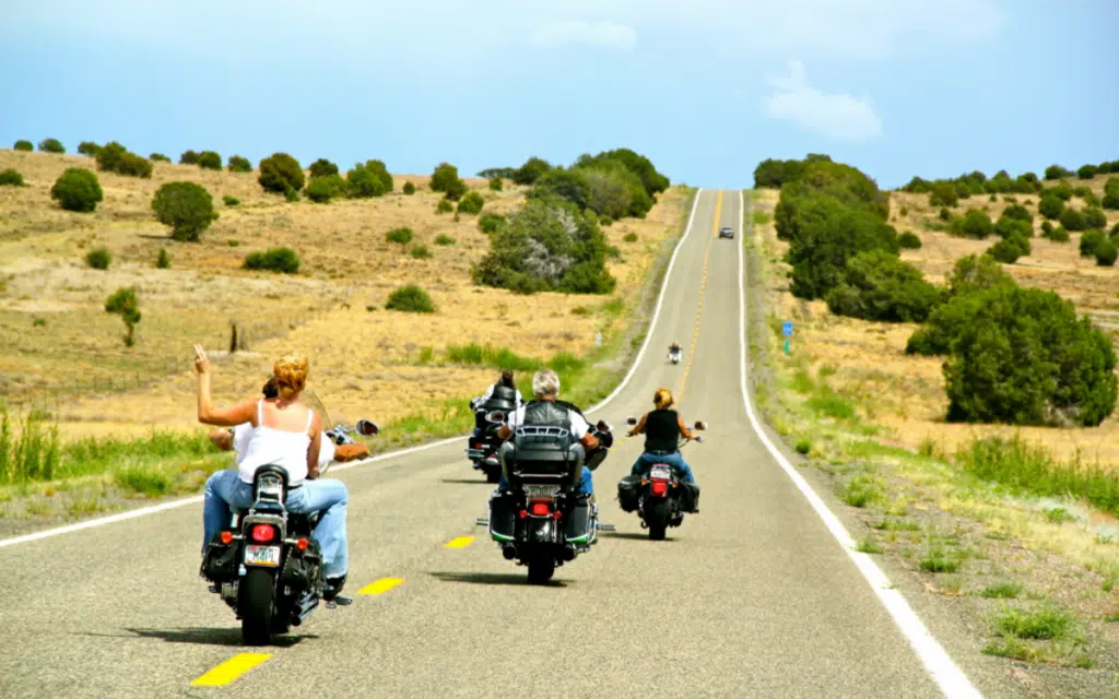 The biker wave is a time-honored tradition that traces back to the Harley-Davidson founders