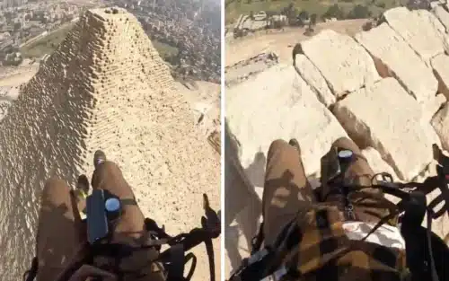 Man paragliding over the pyramids captures what’s written on the top