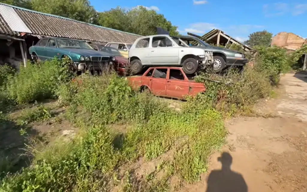 Not even a Cadillac could avoid being left behind in this strange UK car graveyard