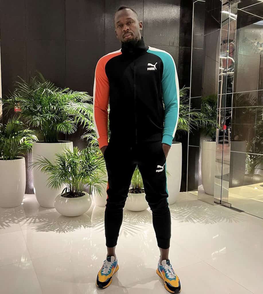 Usain Bolt loses millions - pictured wearing Puma