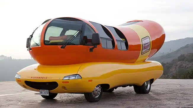 Thousands of Americans compete for chance to drive a 27-foot long 14,050 lbs hot dog