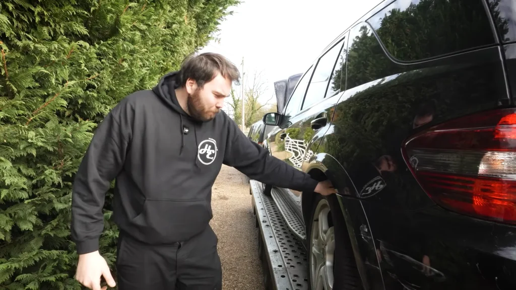 Men buy a damaged 2008 Mercedes ML63 AMG V8 SUV and manage to fix it for under $40