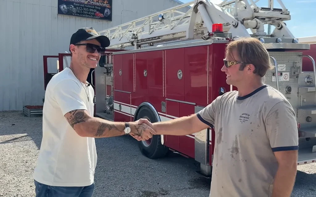 Popular YouTuber WhistlinDiesel bought a fire truck for Christmas and used it to 'save' a family before destroying it with an axe