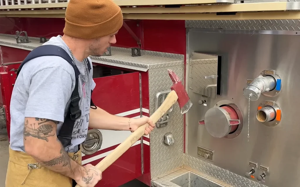 Popular YouTuber WhistlinDiesel bought a fire truck for Christmas and used it to 'save' a family before destroying it with an axe