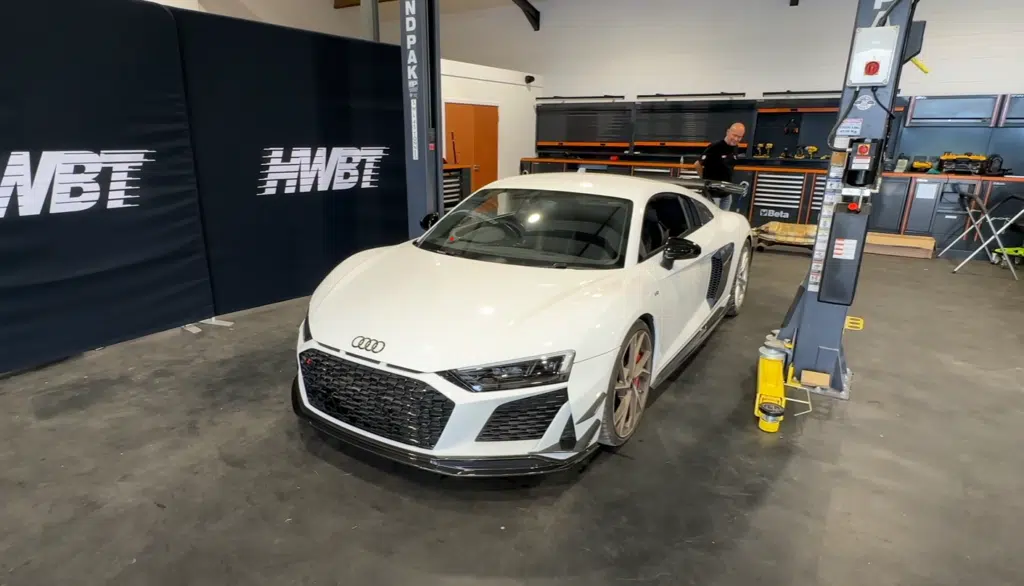 This wrecked Audi R8 underwent a complete car restoration by a YouTuber, featuring performance mods and YouTube rebuild coverage before being gifted