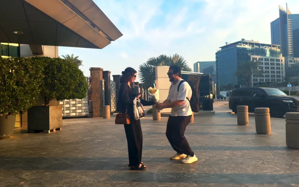 In Dubai, one man set out on a bold hitchhiking challenge, limiting himself to rides in supercars as he raced against time to reach his wife before she finished work.