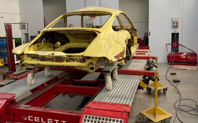 It looks perfect now, but this Summer Yellow Porsche 911 993 actually spent nearly five years at the bottom of a river in Italy