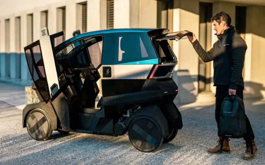 An electric four-wheeler that is part-motorcycle, part-car, made by AEMotion