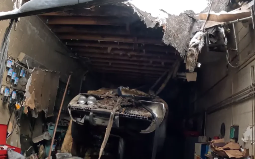 Chevy Corvette sitting on a lift for 50 years in an abandoned building is frozen in time with an unbelievable secret