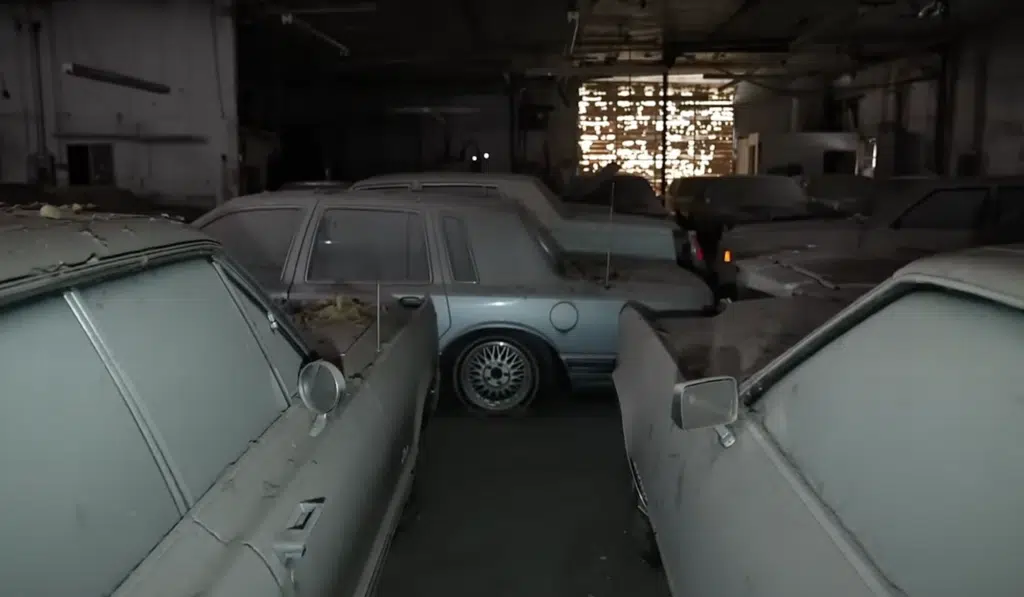 Dealership abandoned 20 years ago found packed with iconic American cars trapped inside