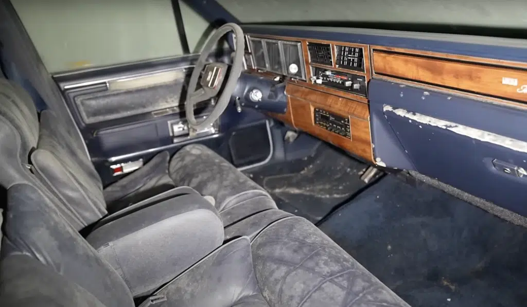 Dealership abandoned 20 years ago found packed with iconic American cars trapped inside