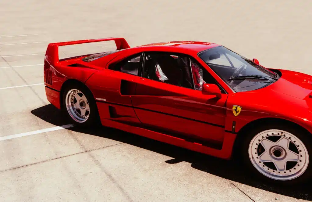 Australian spots Ferrari supercar closely followed by Red Bull Mini in a clash of two worlds
