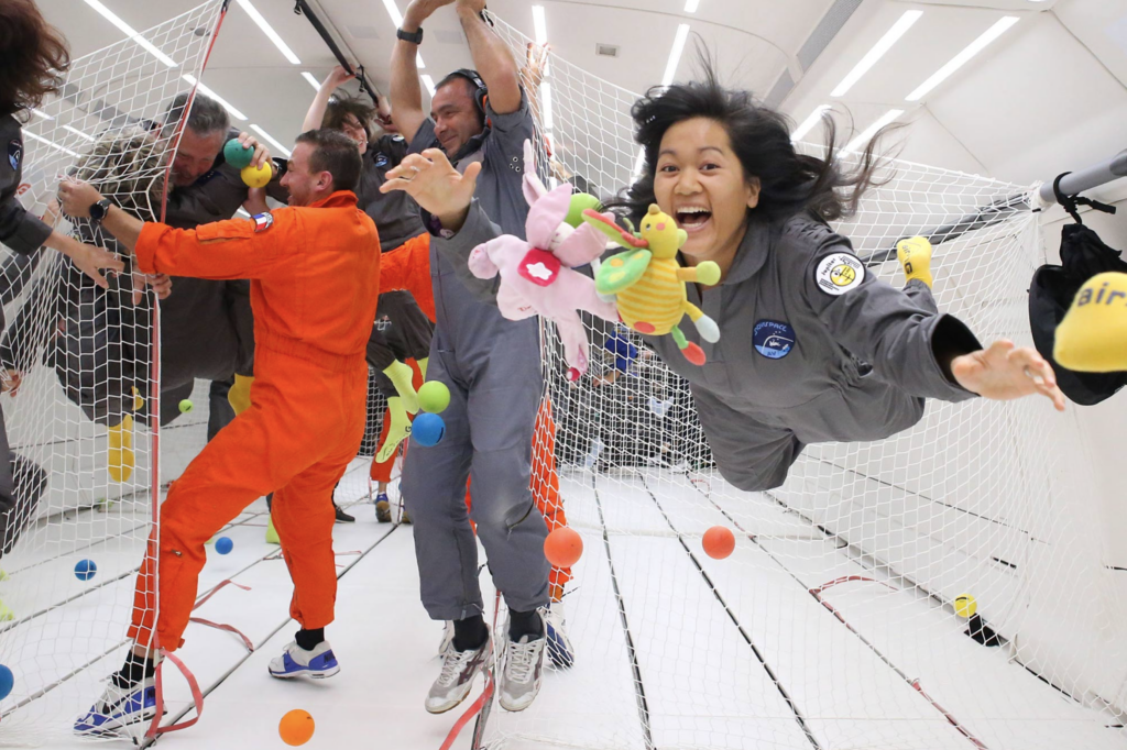 Airbus A310 Zero-G nosedive maneuver makes passengers fly weightless like they're in space