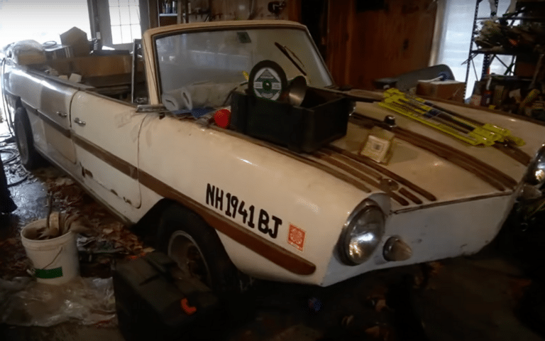 Car graveyard in the woods home to America's largest collection of Amphicars