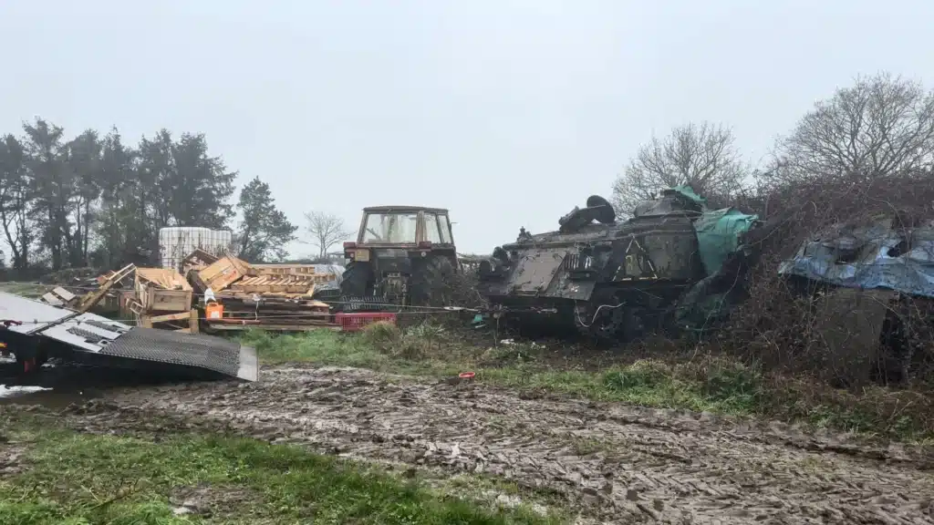 man rescues abandoned tank and starts it