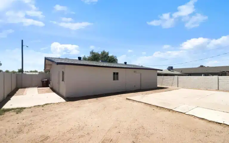 Arizona home for sale has a mobile home inside