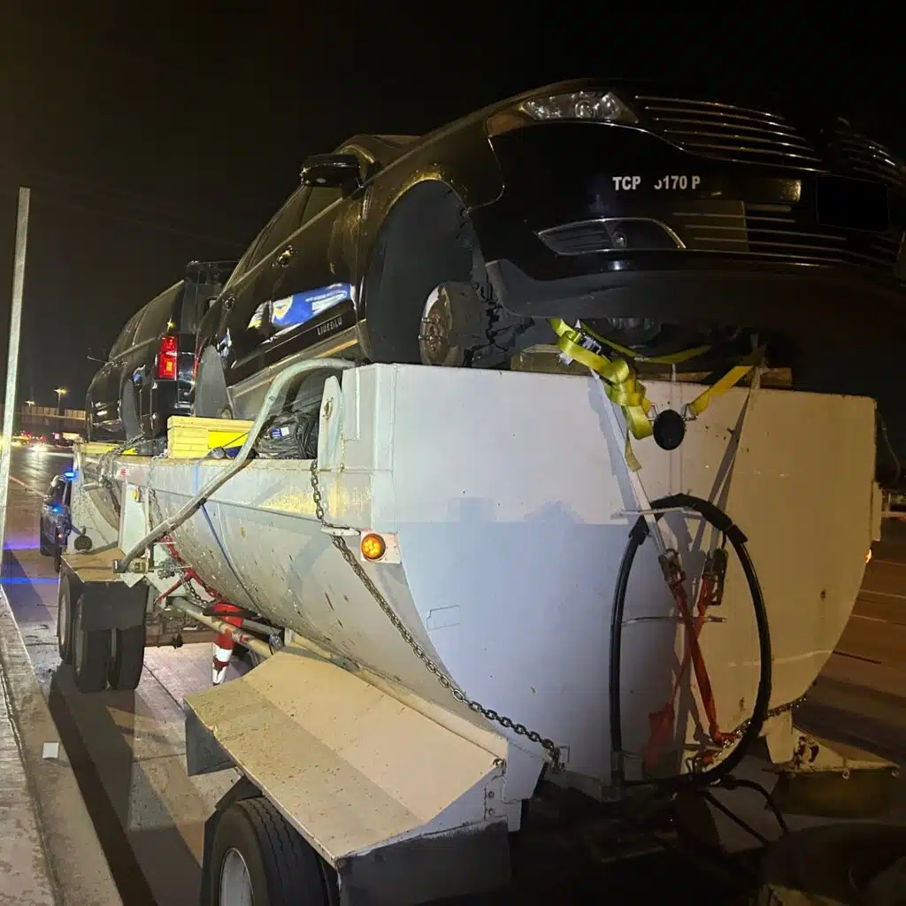 It's hard to believe the way this Arizonan was hauling their Chevy and Lincoln is actually legal