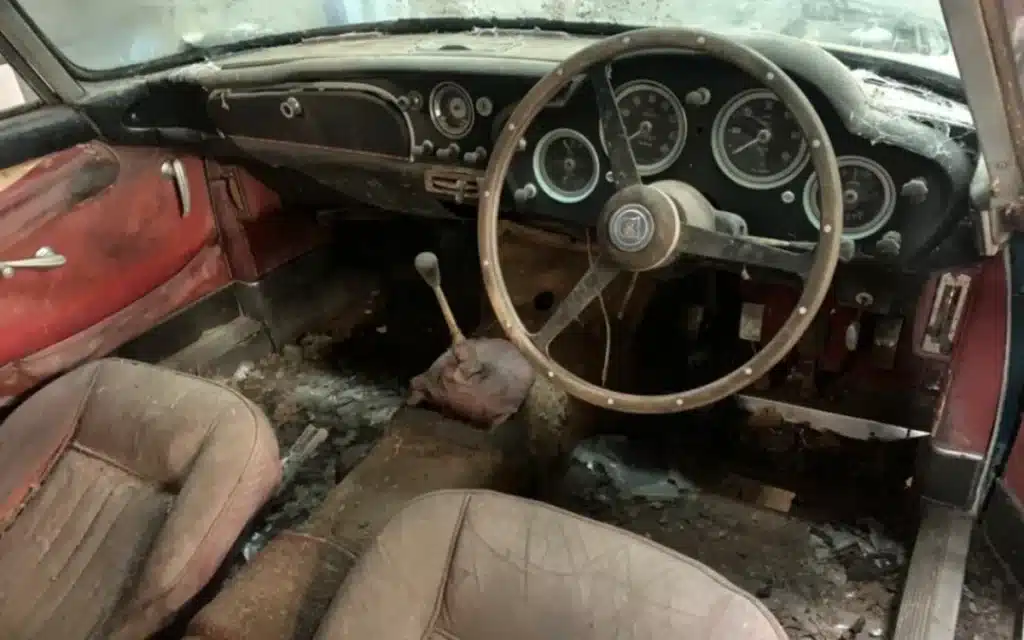 A 1962 Aston Martin DB4 spent 30 years stashed away inside a barn but has now finally been hauled out and is set to go under the hammer for an impressive sum