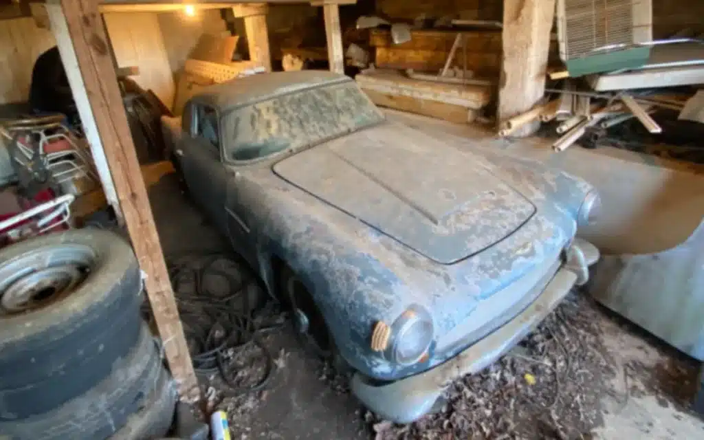 A 1962 Aston Martin DB4 spent 30 years stashed away inside a barn but has now finally been hauled out and is set to go under the hammer for an impressive sum