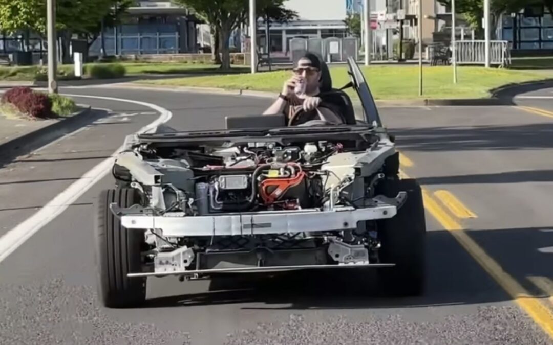 Guy removes the entire body from his Tesla Model 3 to see how fast it will go