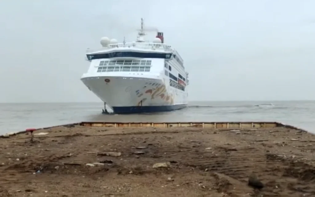 The Alang Ship Breaking Yard in Gujarat, India, is the world's largest ship graveyard, a sprawling coastal zone where the world's retired vessels meet their end.