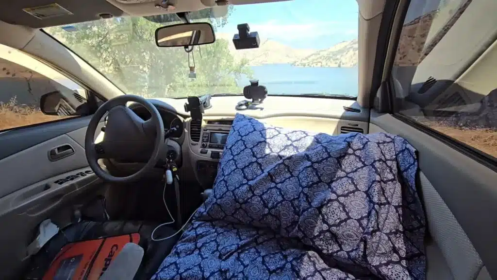 guy lives in car camper tiny home