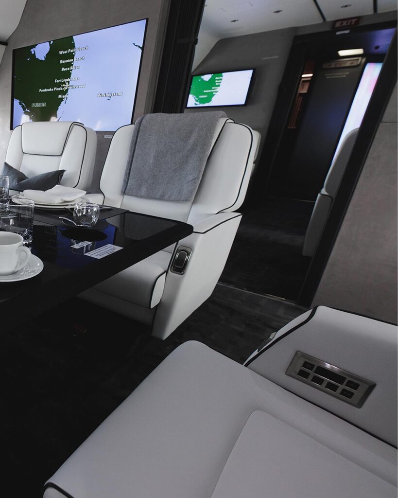 The reclining leather seats aboard the private jet