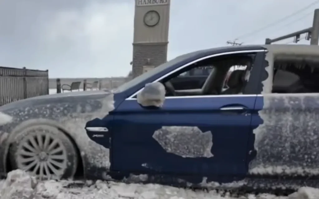 Abandoned BMW turns into a tourist destination after being battered by ice and wind for days