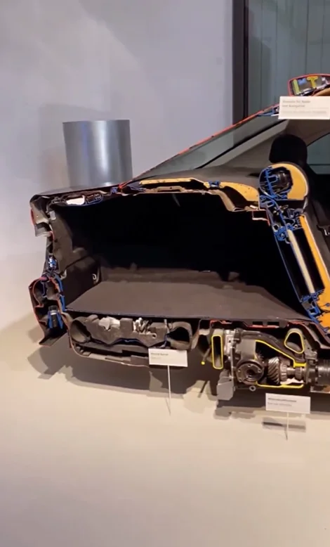 A BMW sliced in half exposes every hidden system from engine to airbags in a stunning display of precision engineering called Lehrschnittfahrzeug