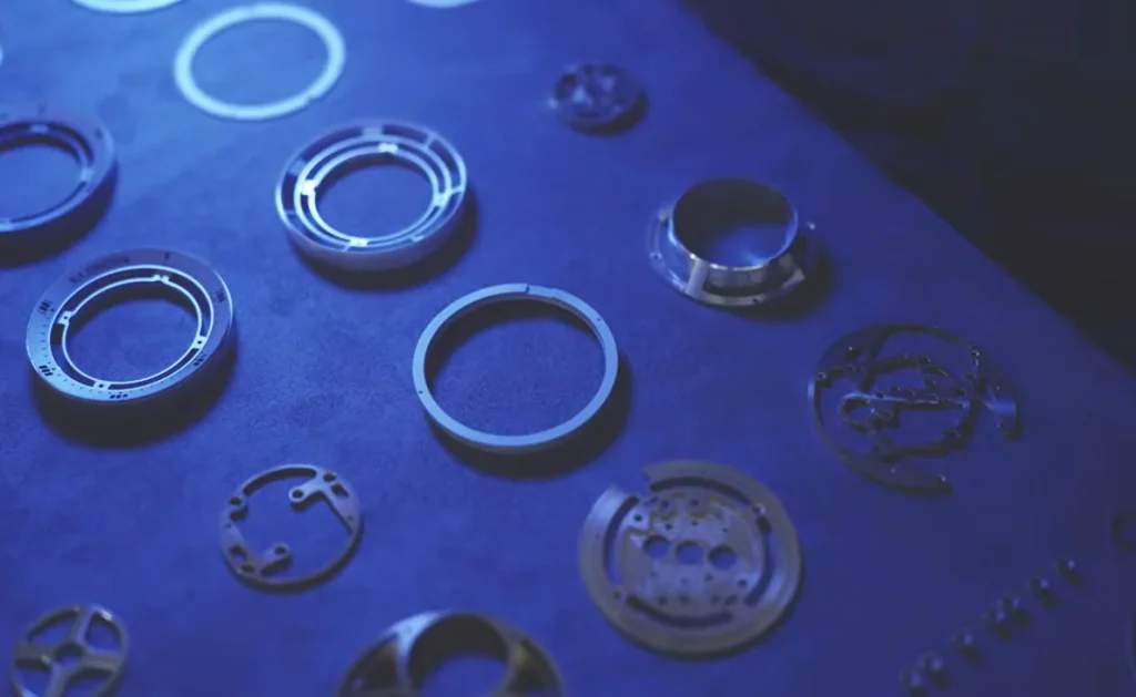 The Bugatti Tourbillon gauge cluster is built like a Swiss watch, with 650+ parts, rubies, gears, and LEDs instead of a screen