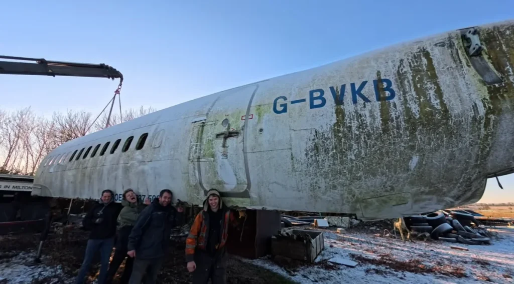 A YouTuber bought a retired Boeing 737 and is burying it underground to turn it into a bunker, revealing what the stripped-out interior really looks like