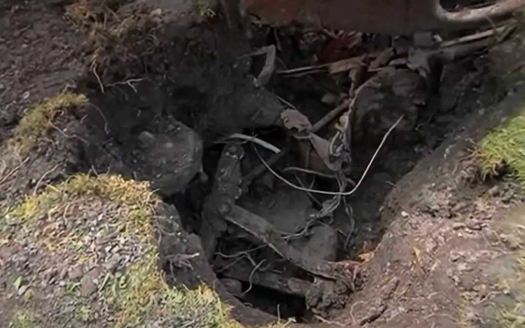 Bizarre mystery of car dug up in man's garden while he renovates is finally solved