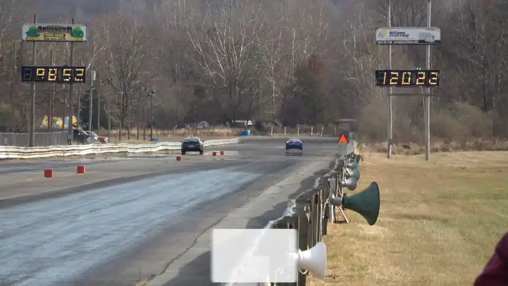 Chevy Corvette E-Ray vs Ford Mustang Dark Horse in drag race