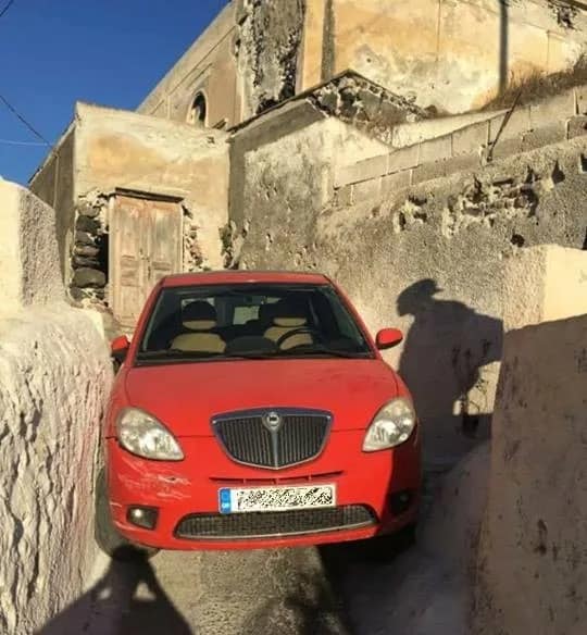 car stuck in Santorini years before the Nissan Micra