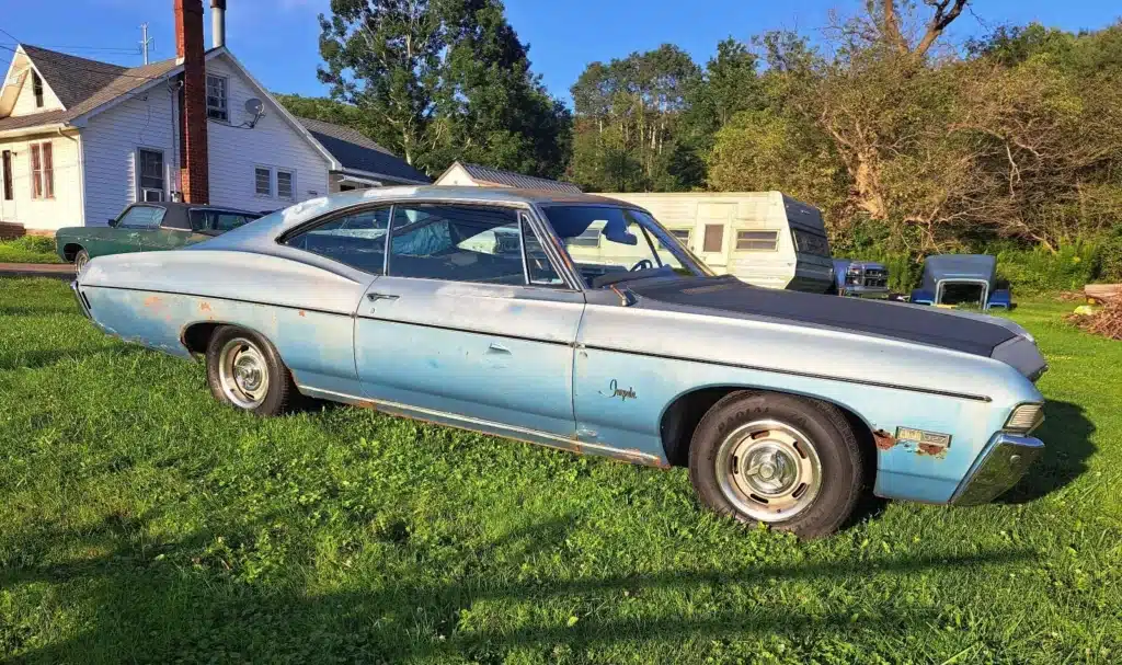 Chevy Impala parked in New York ready to return to the road after three decades